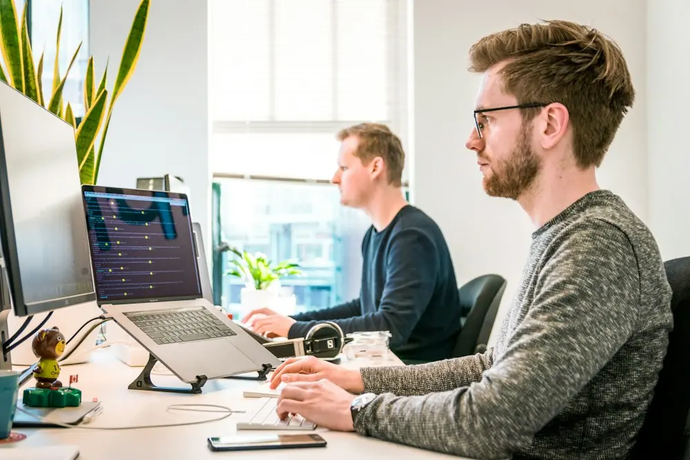 Publishers working at their computer screens